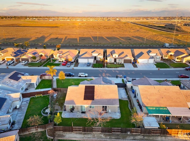 aerial view at dusk with a residential view