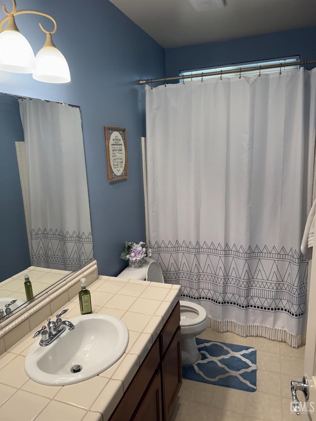 11908 Nebula Ct, Bakersfield, CA 93312 - bathroom featuring vanity, toilet, and tile patterned flooring