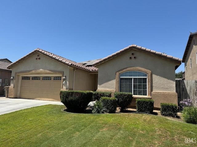 11908 Nebula Ct, Bakersfield, CA 93312 - mediterranean / spanish house with solar panels, stucco siding, an attached garage, driveway, and a tile roof