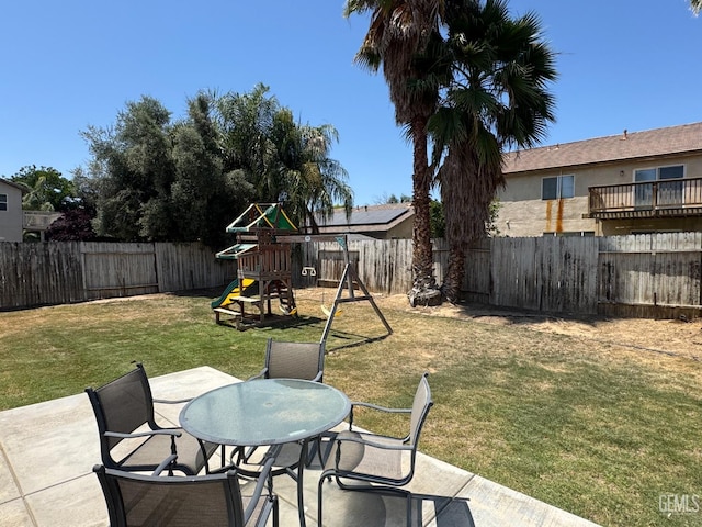 11908 Nebula Ct, Bakersfield, CA 93312 - view of patio / terrace featuring outdoor dining area and a playground