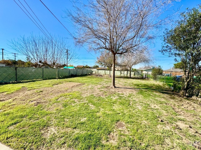 view of yard featuring a fenced backyard