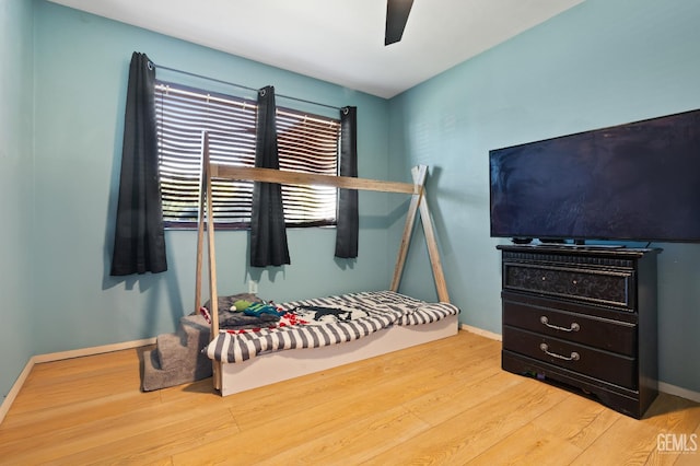 1125 Rose Ave, Shafter, CA 93263 - bedroom with wood finished floors, baseboards, and ceiling fan