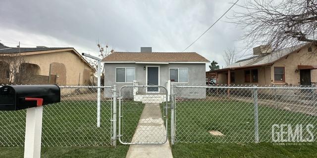 bungalow with a front yard