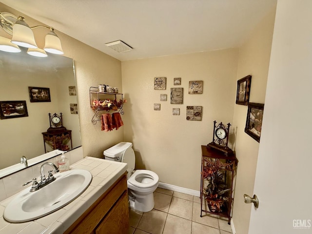 4600 Beechwood St Unit 135, Bakersfield, CA 93309 - bathroom with toilet, vanity, and tile patterned flooring