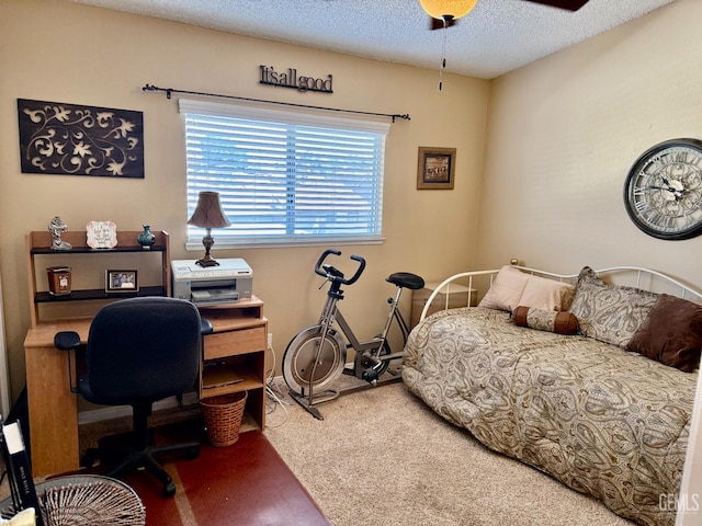 4600 Beechwood St Unit 135, Bakersfield, CA 93309 - bedroom featuring carpet floors, a textured ceiling, a desk, and ceiling fan