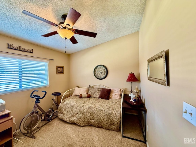 4600 Beechwood St Unit 135, Bakersfield, CA 93309 - carpeted bedroom with a textured ceiling and ceiling fan