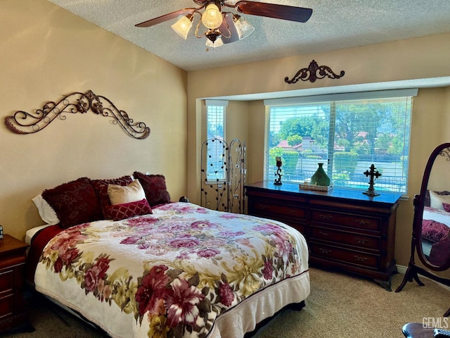 4600 Beechwood St Unit 135, Bakersfield, CA 93309 - bedroom with a textured ceiling, carpet floors, and a ceiling fan