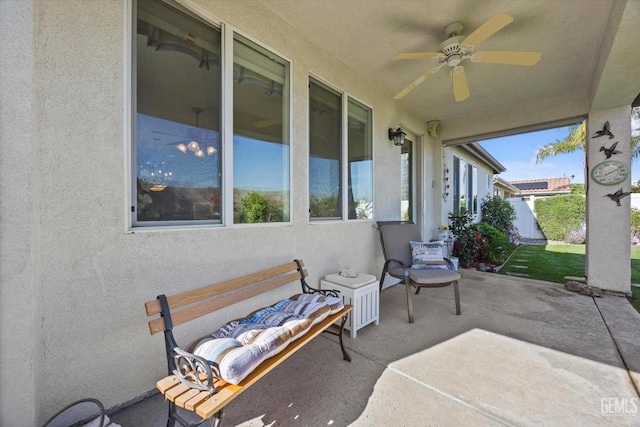 view of patio / terrace featuring ceiling fan