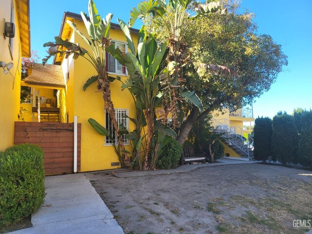 view of side of home with a patio