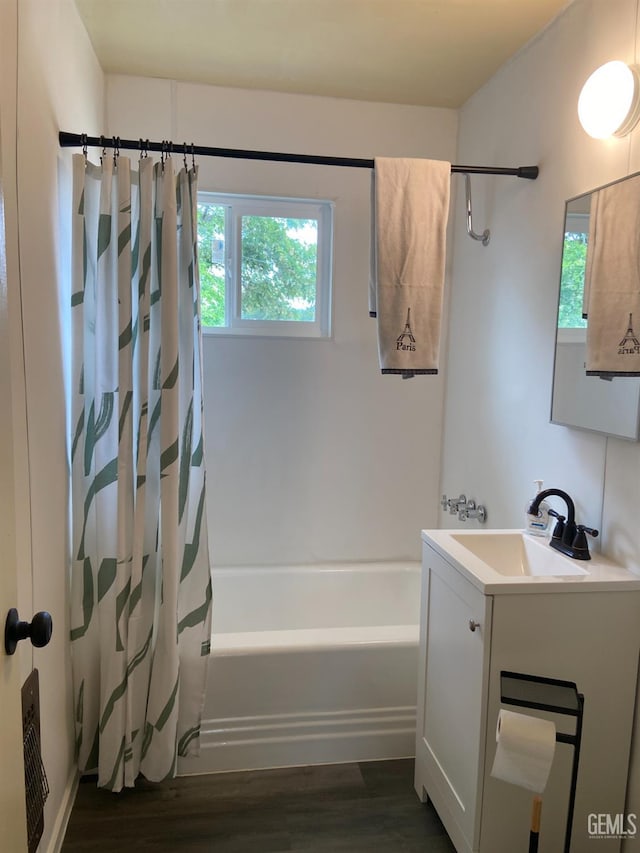 4856 Morales St, New Cuyama, CA 93254 - full bath featuring vanity, wood finished floors, healthy amount of natural light, and shower / bathtub combination with curtain