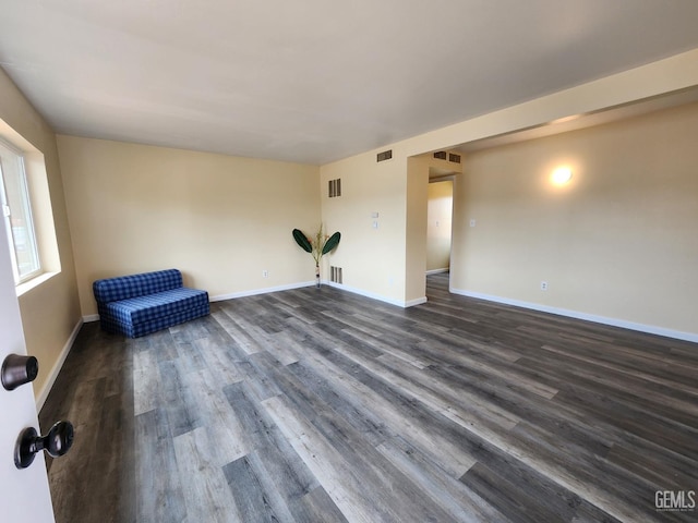 4856 Morales St, New Cuyama, CA 93254 - empty room featuring dark wood-style flooring and baseboards