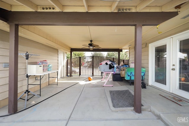 view of patio featuring ceiling fan and french doors