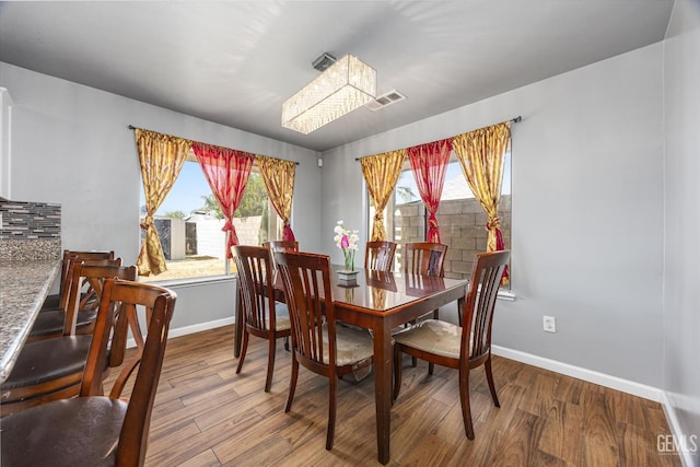 1914 Hummingbird Ave, Delano, CA 93215 - dining area with baseboards and wood finished floors