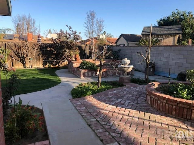 surrounding community with a patio area