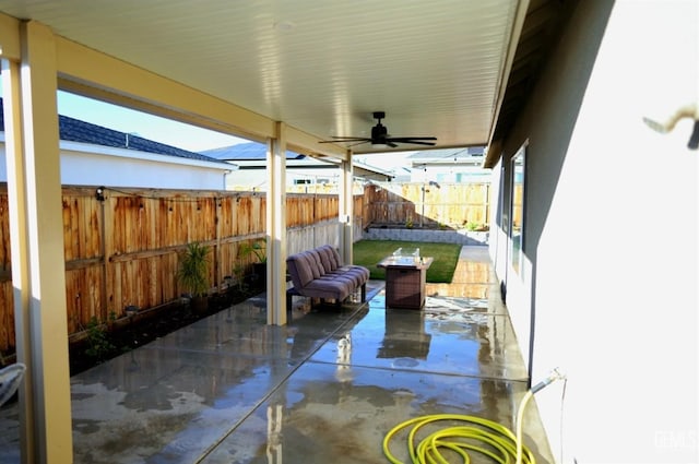 view of patio / terrace featuring ceiling fan