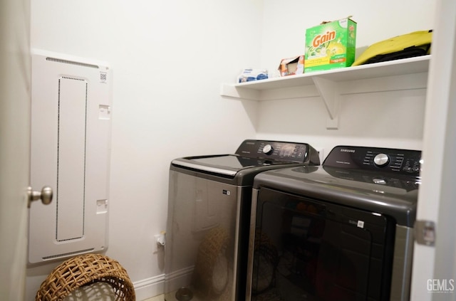 clothes washing area featuring washing machine and dryer