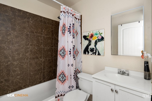 full bathroom featuring shower / bath combination with curtain, toilet, and vanity