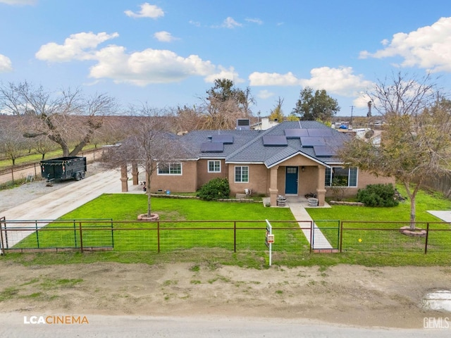 single story home with a front lawn and solar panels