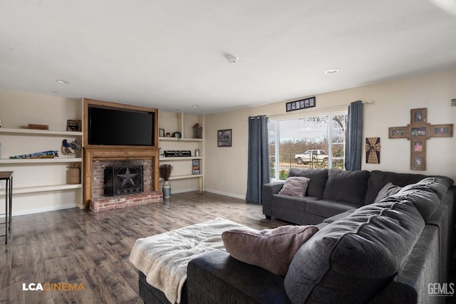 living room featuring a fireplace and hardwood / wood-style floors