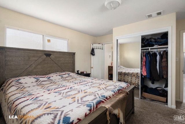 bedroom with carpet and a closet