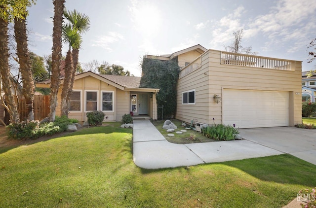 view of front of property with a garage, a front lawn, and a balcony