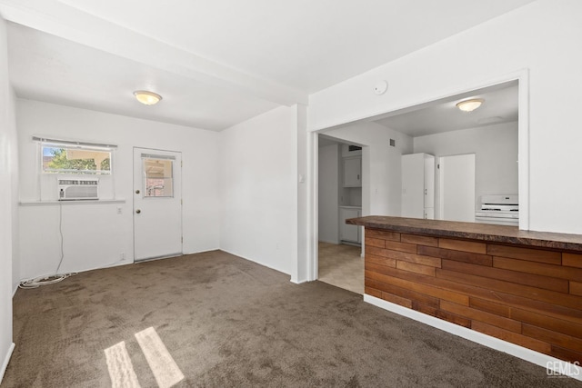 2310 B St, Bakersfield, CA 93301 - unfurnished living room with carpet flooring and cooling unit