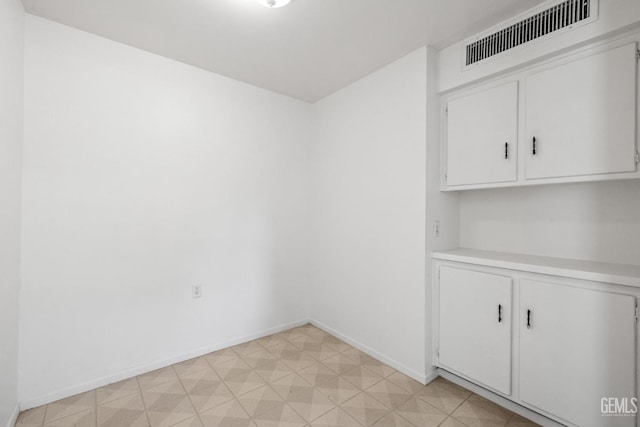 2310 B St, Bakersfield, CA 93301 - spare room with light floors and baseboards