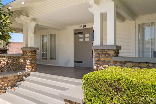 2310 B St, Bakersfield, CA 93301 - entrance to property with a porch and stone siding