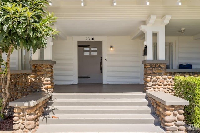 2310 B St, Bakersfield, CA 93301 - entrance to property featuring a porch and stone siding