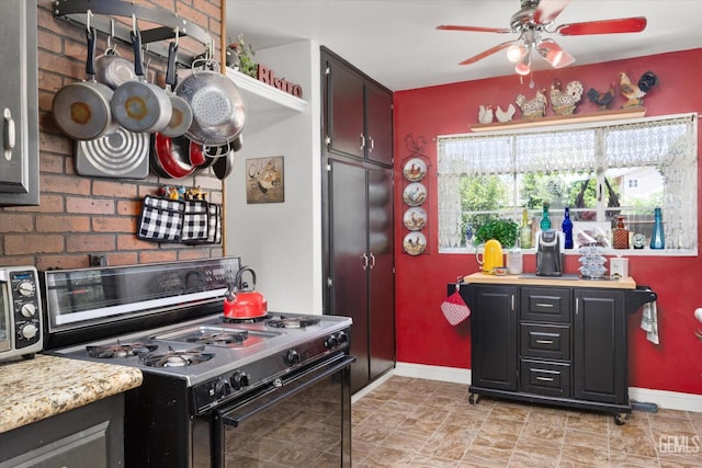 3808 Navajo Ave, Bakersfield, CA 93309 - kitchen featuring black range with gas cooktop, ceiling fan, and light countertops