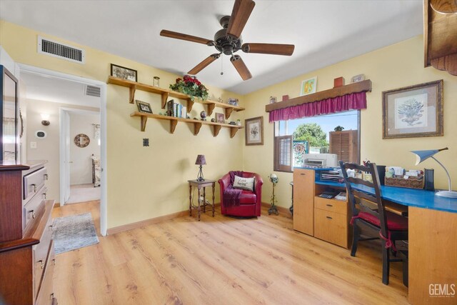 3808 Navajo Ave, Bakersfield, CA 93309 - home office with light wood finished floors and a ceiling fan