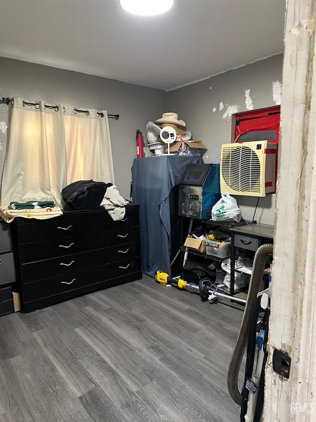 bedroom with wood finished floors