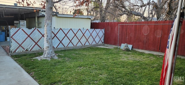 view of yard with a fenced backyard