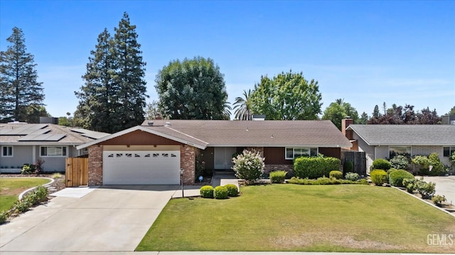 6309 Desert Hills Ave, Bakersfield, CA 93309 - single story home with an attached garage, concrete driveway, and brick siding