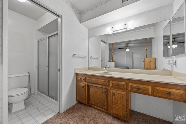 6309 Desert Hills Ave, Bakersfield, CA 93309 - full bathroom with a shower stall, vanity, ceiling fan, and wallpapered walls