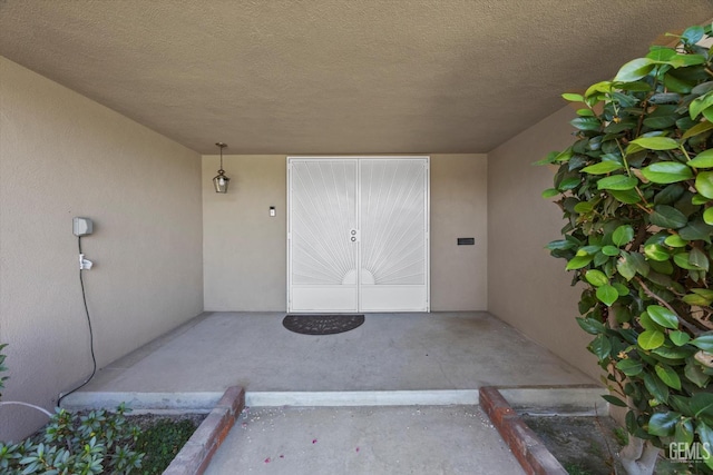 6309 Desert Hills Ave, Bakersfield, CA 93309 - view of exterior entry featuring stucco siding