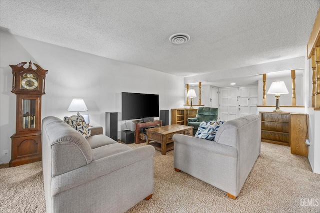 6309 Desert Hills Ave, Bakersfield, CA 93309 - living area with light colored carpet and a textured ceiling