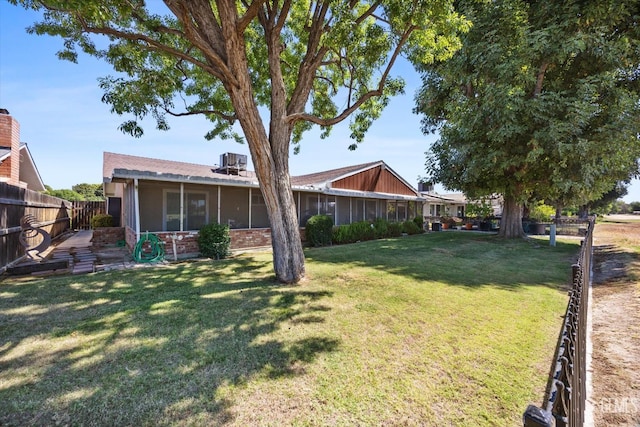 6309 Desert Hills Ave, Bakersfield, CA 93309 - fenced backyard with a sunroom