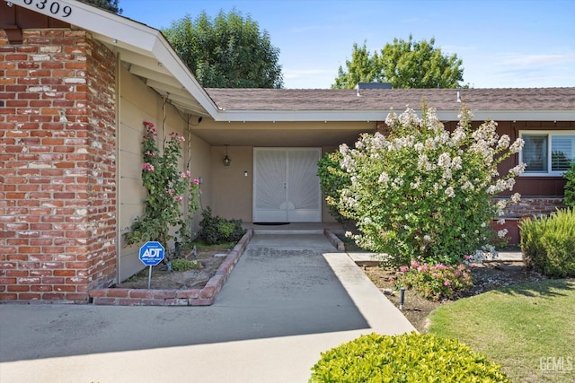 6309 Desert Hills Ave, Bakersfield, CA 93309 - property entrance with stucco siding and brick siding