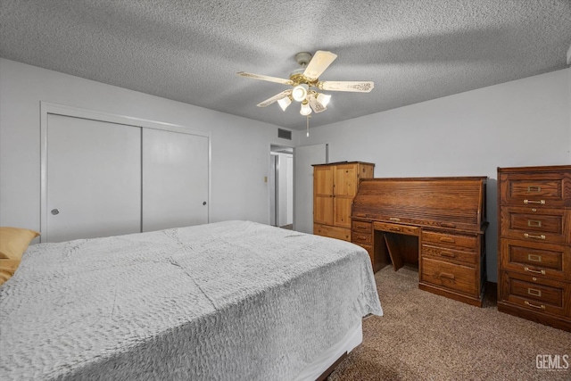 6309 Desert Hills Ave, Bakersfield, CA 93309 - bedroom with light colored carpet, a closet, ceiling fan, and a textured ceiling