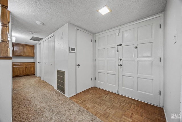 6309 Desert Hills Ave, Bakersfield, CA 93309 - foyer entrance with a textured ceiling