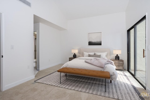 bedroom with light carpet, access to outside, and vaulted ceiling