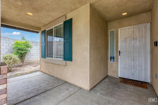 9610 Tahiti Ave, Bakersfield, CA 93311 - property entrance with stucco siding