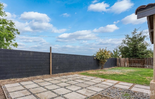 9610 Tahiti Ave, Bakersfield, CA 93311 - fenced backyard featuring a patio area