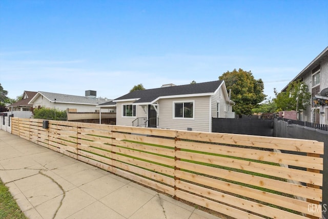 single story home with fence private yard