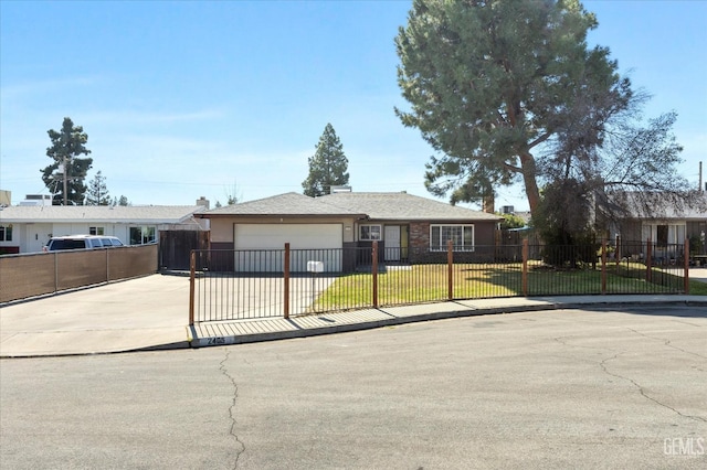 ranch-style house with stucco siding, a front lawn, a fenced front yard, concrete driveway, and an attached garage