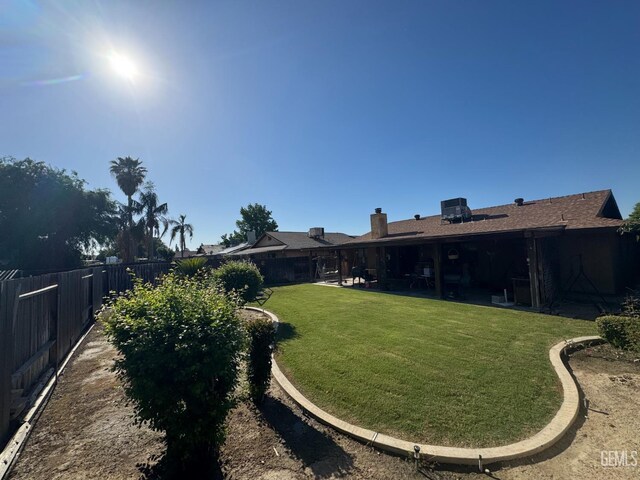 4105 Thatch Ave, Bakersfield, CA 93313 - view of yard featuring a patio area
