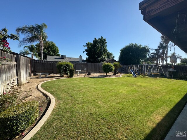 4105 Thatch Ave, Bakersfield, CA 93313 - view of yard featuring a playground