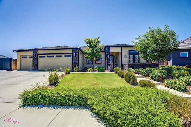 802 Barre Ct, Bakersfield, CA 93314 - prairie-style house with stone siding, a garage, driveway, and a front yard