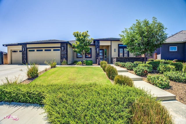 802 Barre Ct, Bakersfield, CA 93314 - prairie-style house featuring stone siding, a garage, driveway, and a front lawn